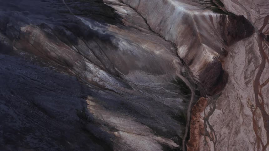 A landscape with rocks ice and water