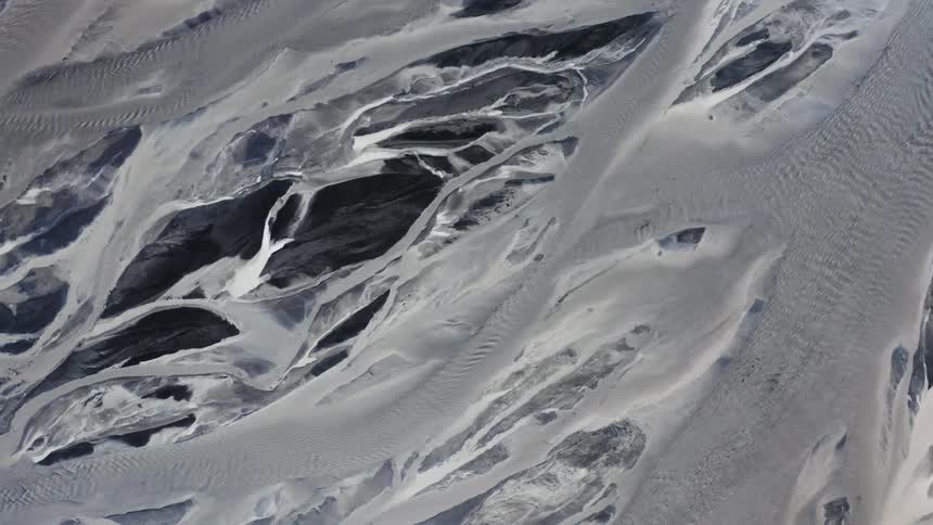 An aerial view of a river flowing