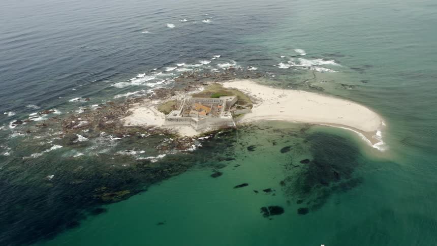 Aerial view of a fort on a small island in the ocean