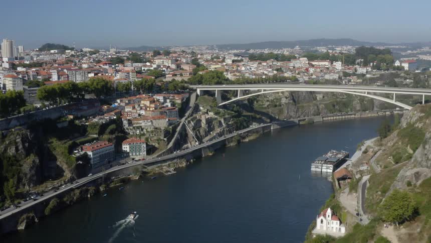 A river through a city during the day
