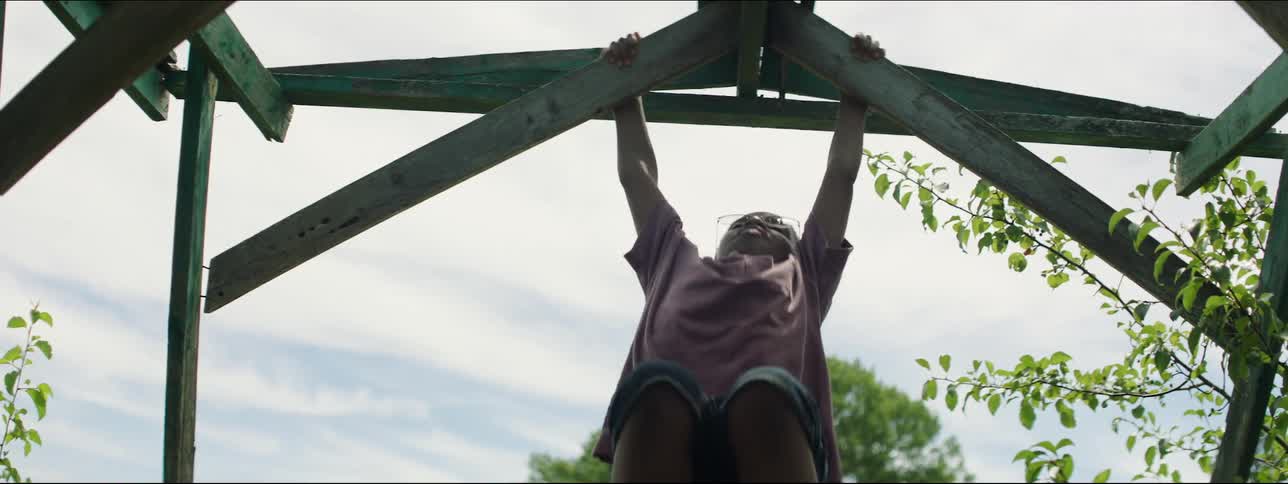Black child swinging