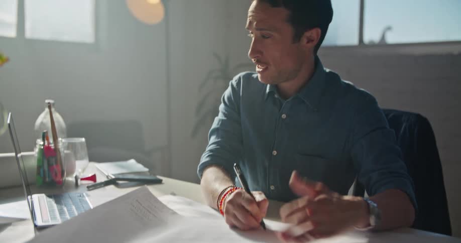 Person talking and writing