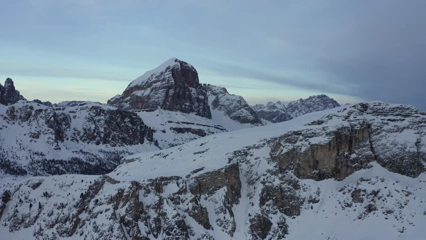 A dusting of snow covers the peaks and valleys in a mountain range
