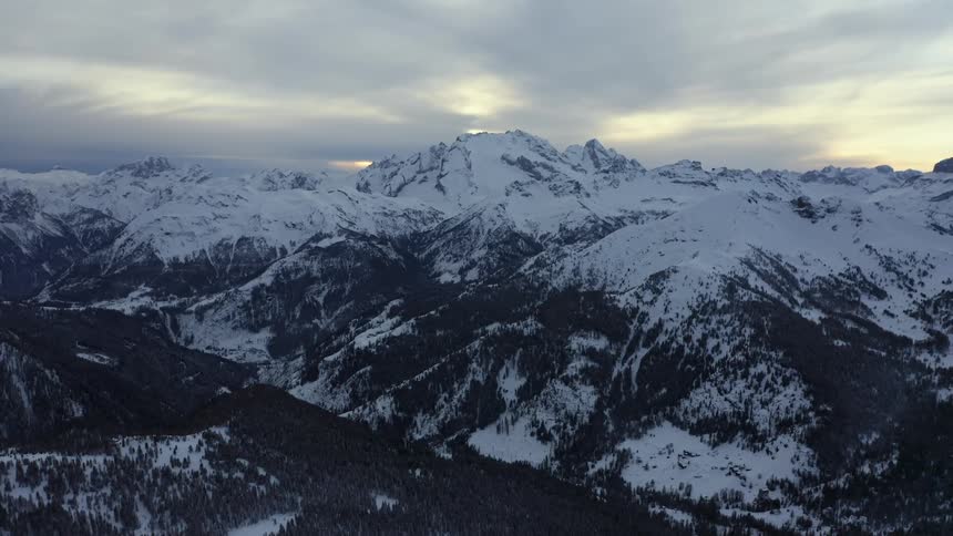 The mountain range is covered with snow