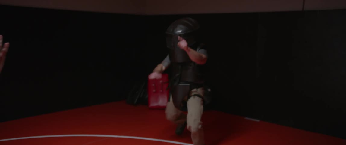 Self-defense practice while wearing pads