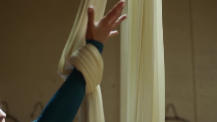 A view of a woman preparing to do acrobatics