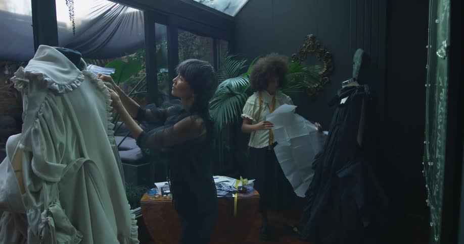 A view of women working on clothes in a room
