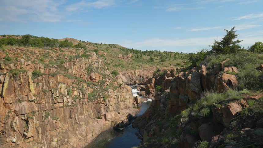 A river is running through a deep ravine