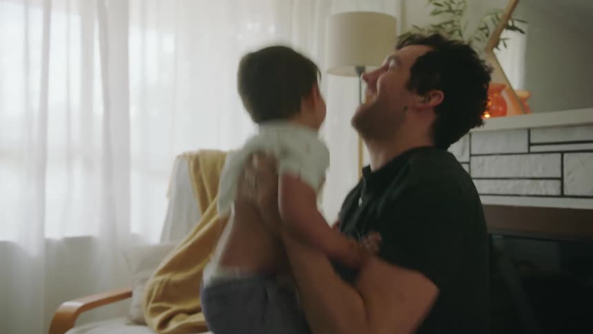 A father has fun with his son