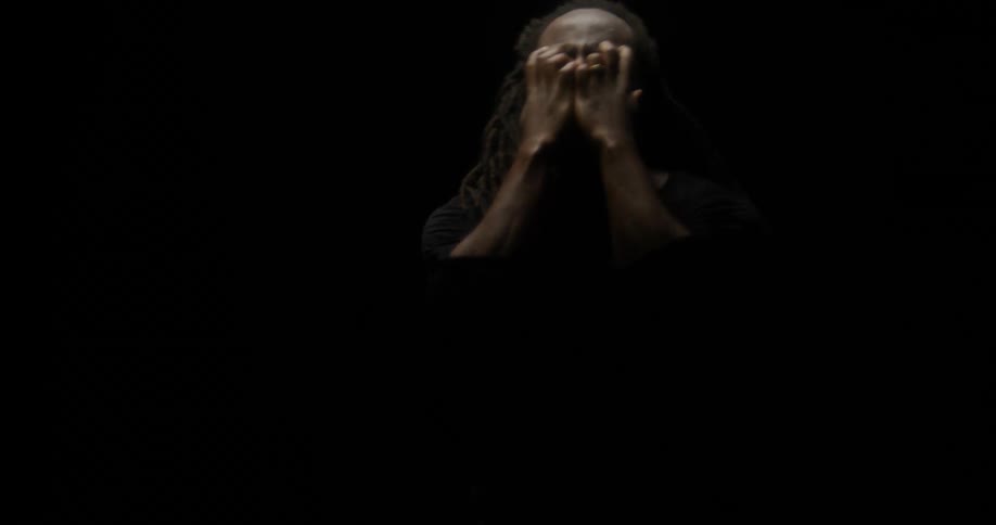 Person crying indoors