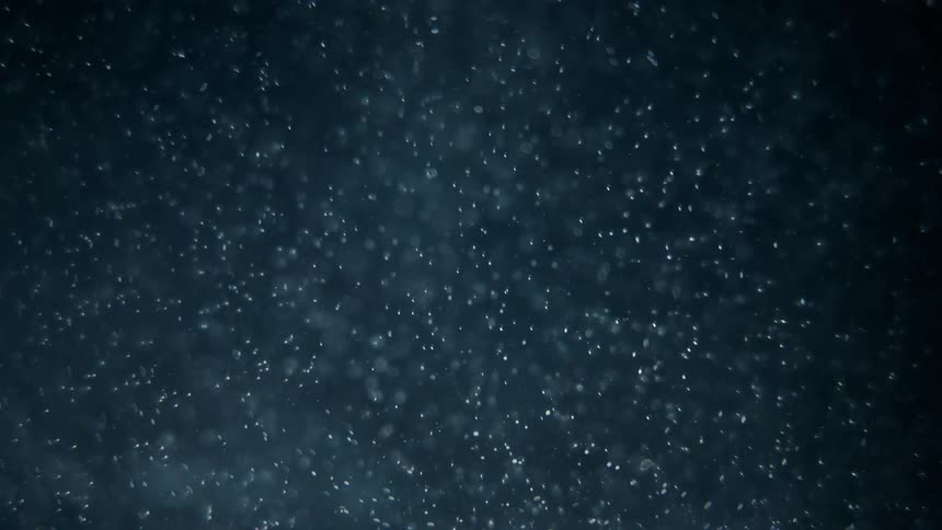 It is snowing at night