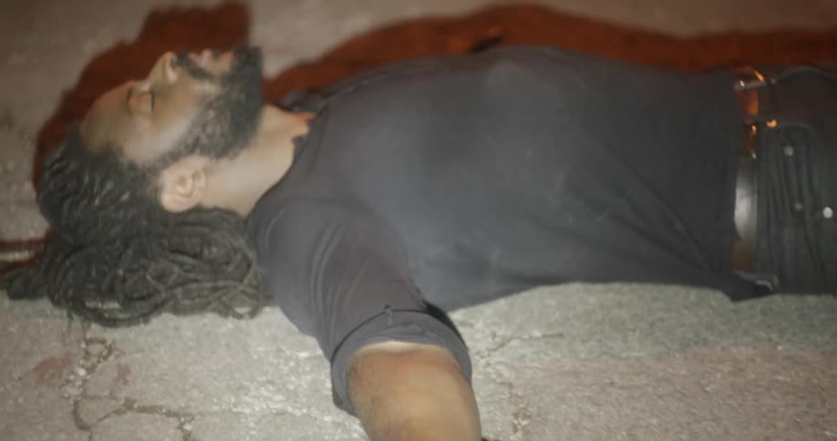 Body lying on ground
