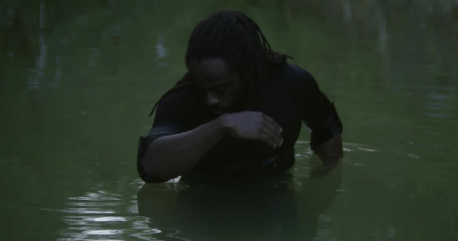 Black person moving in water