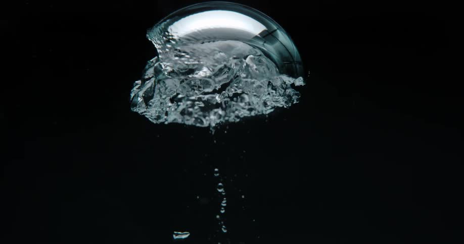 A view of a bubble floating in the ocean