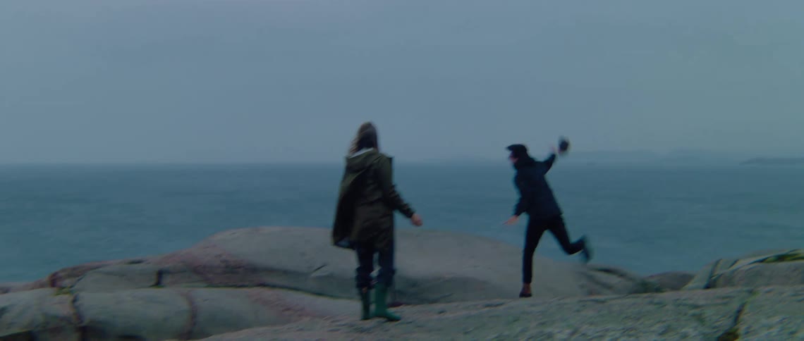 People throwing rocks