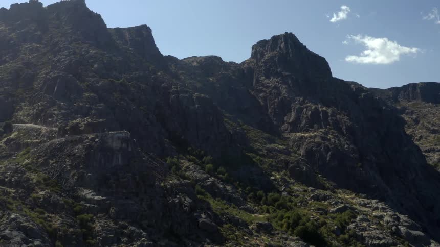 An aerial view of a rocky terrain during the daytime