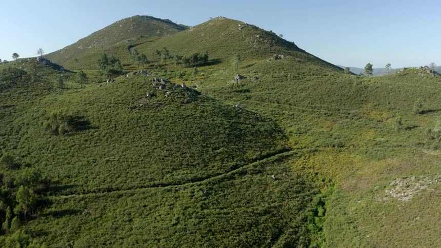 The tall mountain has many ridges