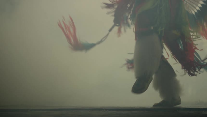 A native dancer does a ceremonial dance