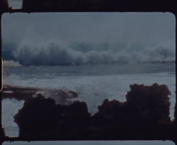 A view of waves crashing on the shore