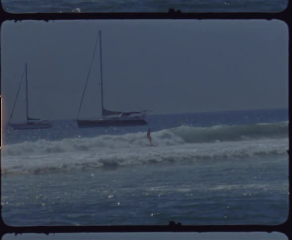 People surfing waves