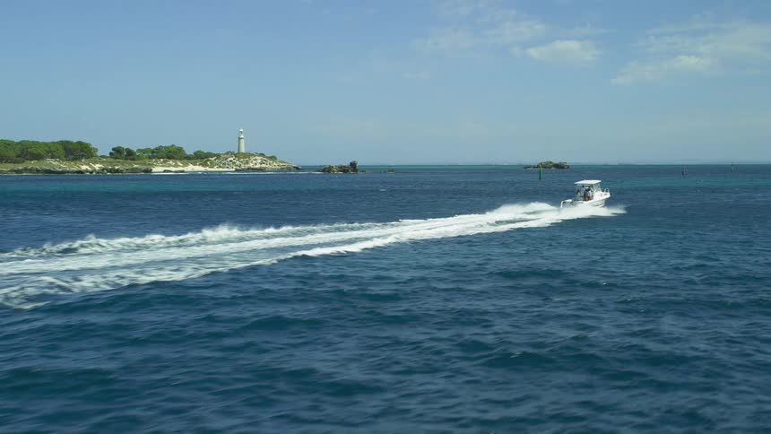 Boat driving across water
