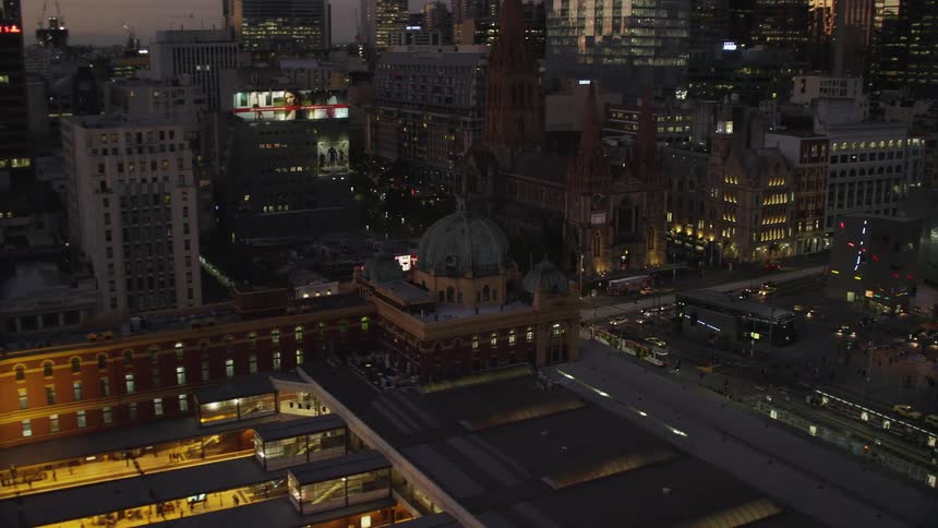 Heavy traffic moves through a city at night