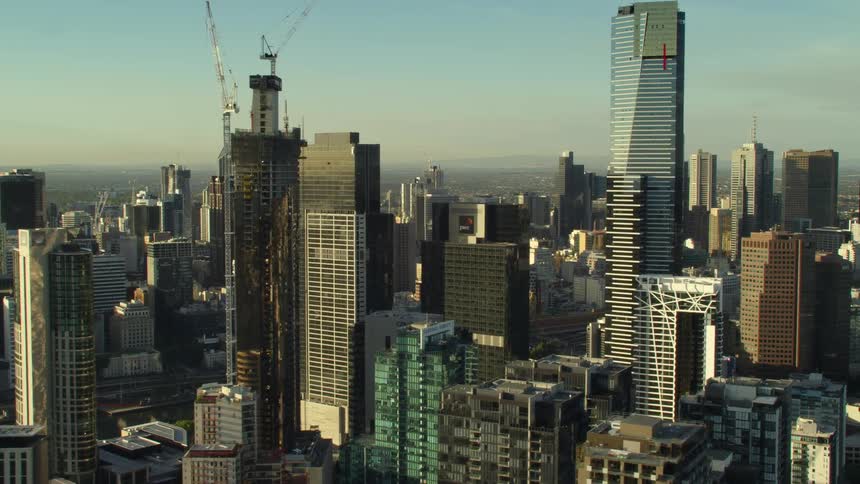 A big city with towers and buildings high in the sky