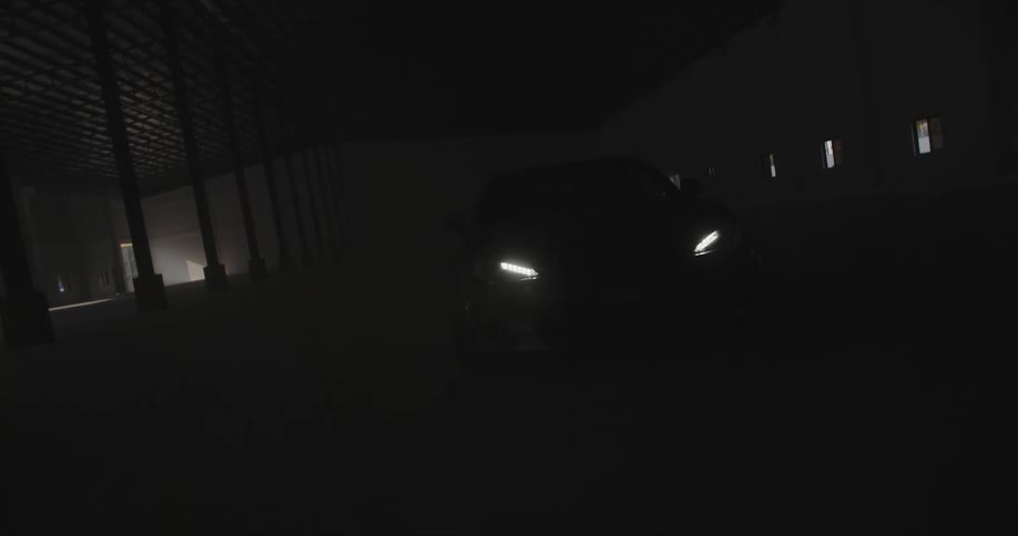 A car driving through a parking garage