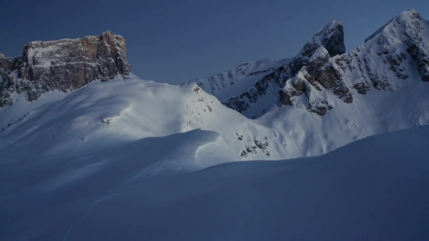 Deep snow clings to the mountain tops
