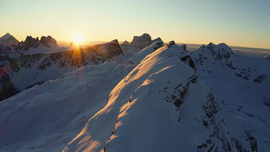 A view of a mountain range covered in snow