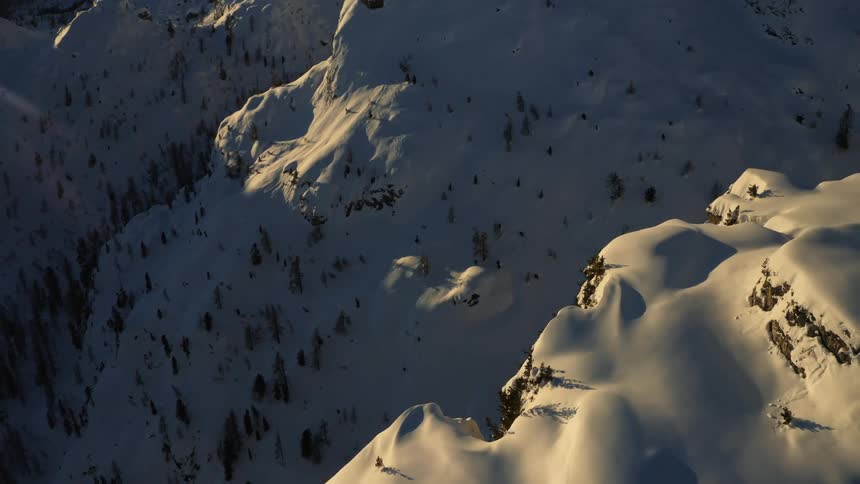 A mountain range covered in snow and ice