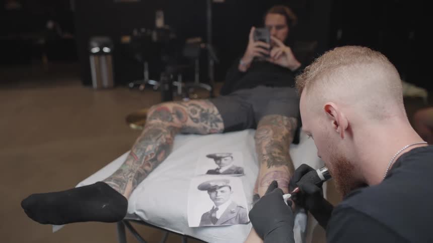 Person recieving tattoo