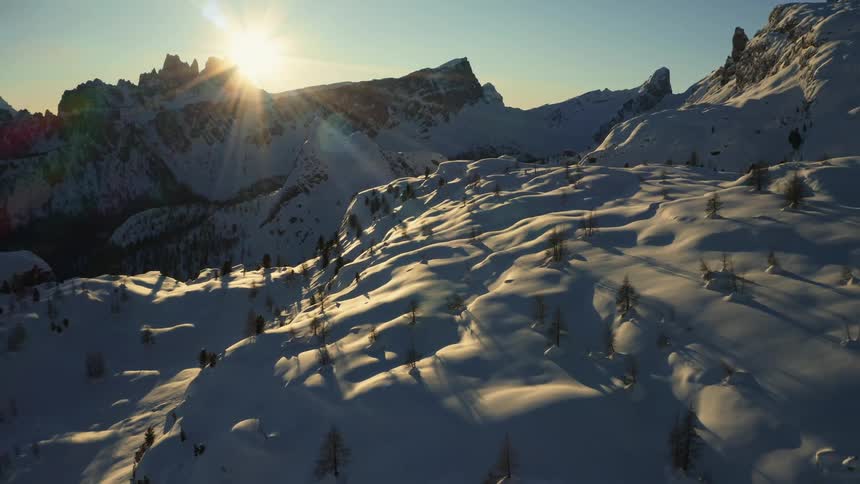 Hardened snow covers a mountain
