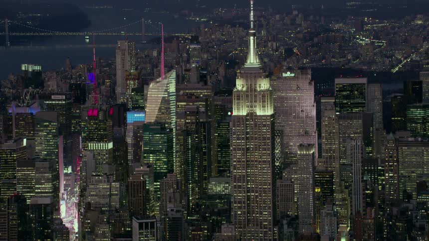 Aerial view of the night lights and skyscrapers on new york city at night
