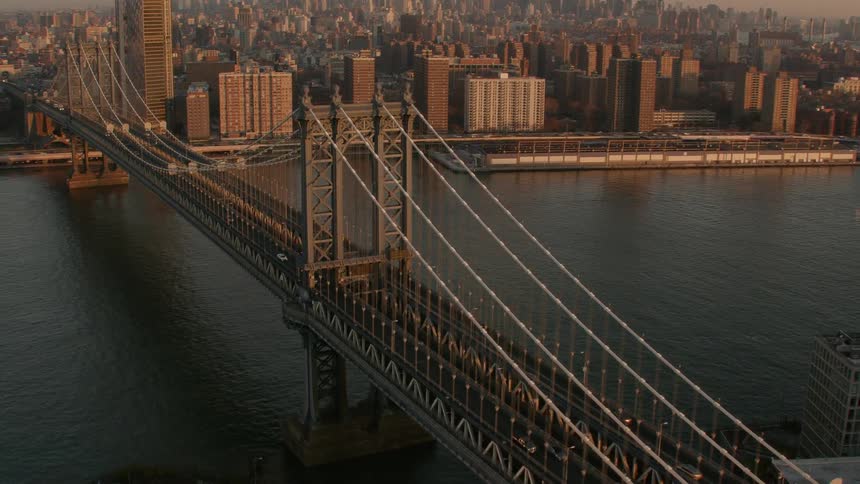 Aerial view of the manhattan bridge in new york city at sunset