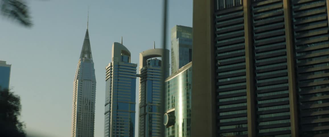 Tall skyscrapers on the city skyline at sunset
