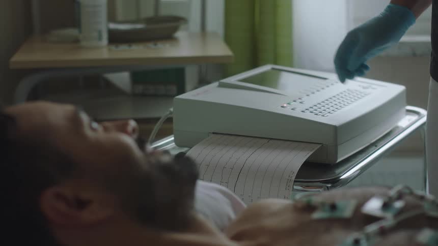 A man connected to a machine