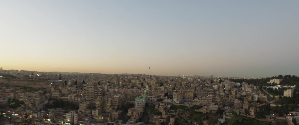 The buildings of a metropolis in the evening