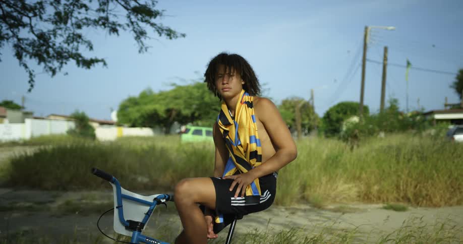 A person sitting on a bike