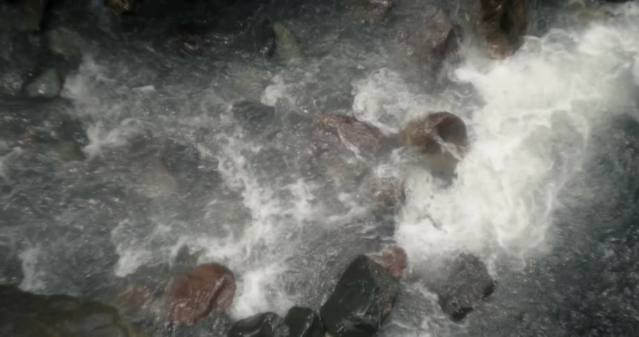 A stream flows over rocks