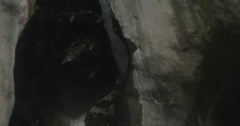 The water rushes down the rocks