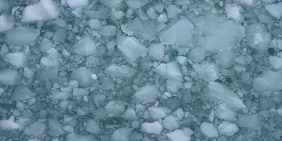 Ice blocks and chunks move in the ocean