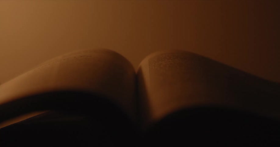 The light is flickering on the book