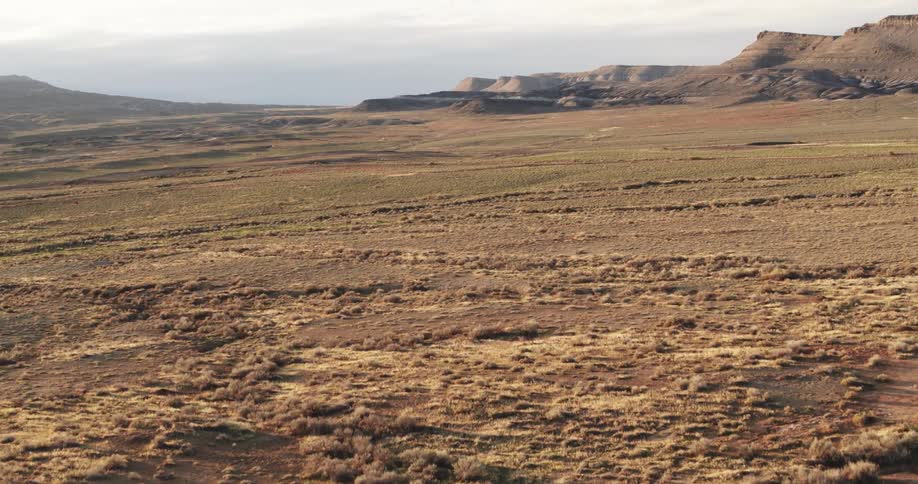 A man is hiking by the cliff