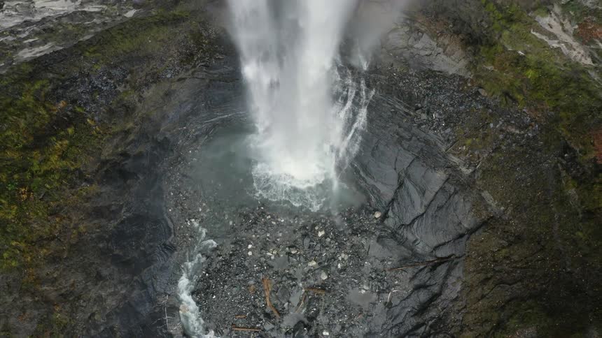 Waterfall cascades down mountainside