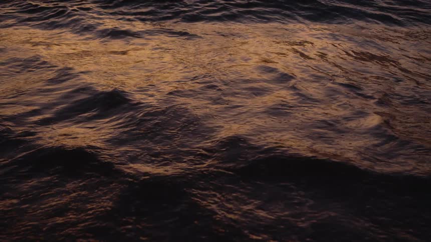 The ocean waves hit the shore