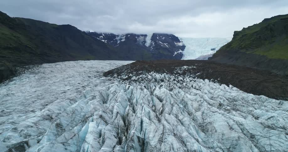 Slabs of ice fill the ground in a canyon