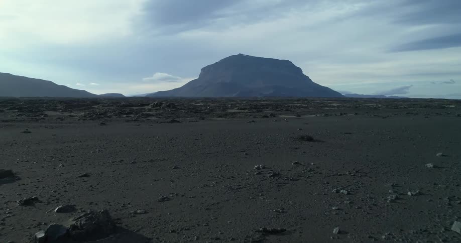 The field before the mountain is barren