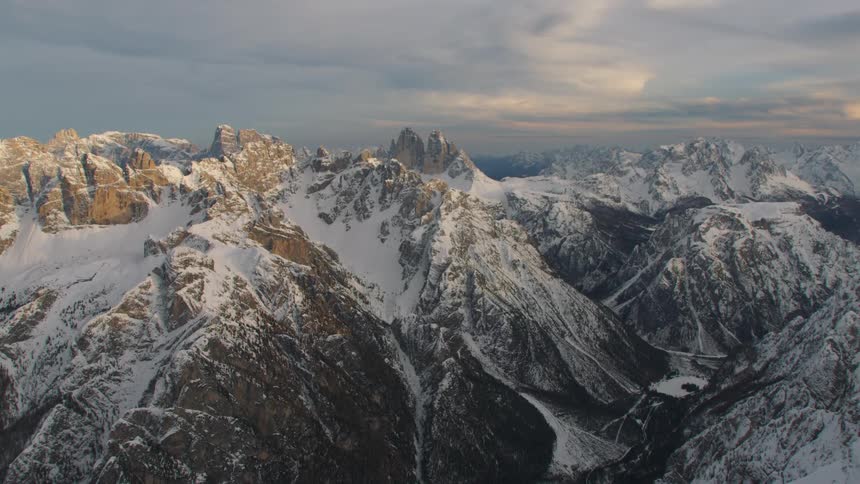 The mountain range is covered in snow