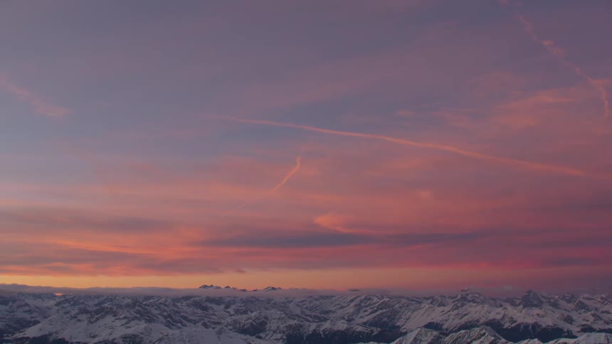 The sky is red at dawn on the mountains